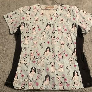 Pattern women’s scrub shirt, size large the brand is green town.